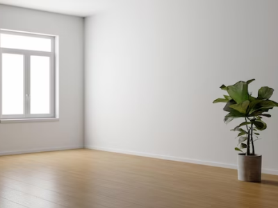 Livingroom with a window and a white wall